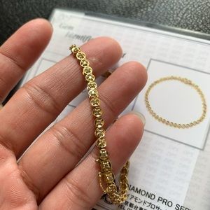 18k yellow gold with natural diamonds